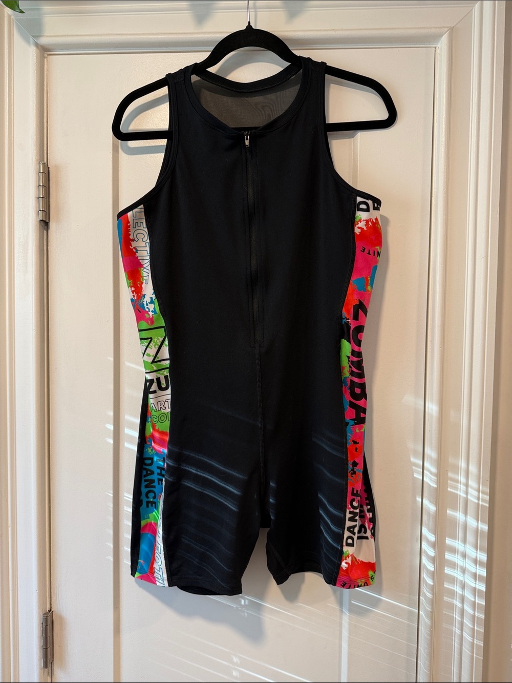 Zumba Fitness Black Unitard with Multicolor Side Panels.WORN ONLY ONCE